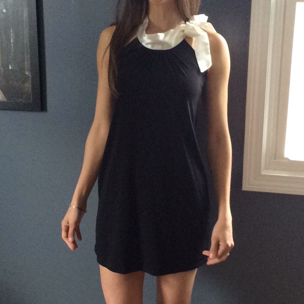 Black dress with white lace for bow around neck